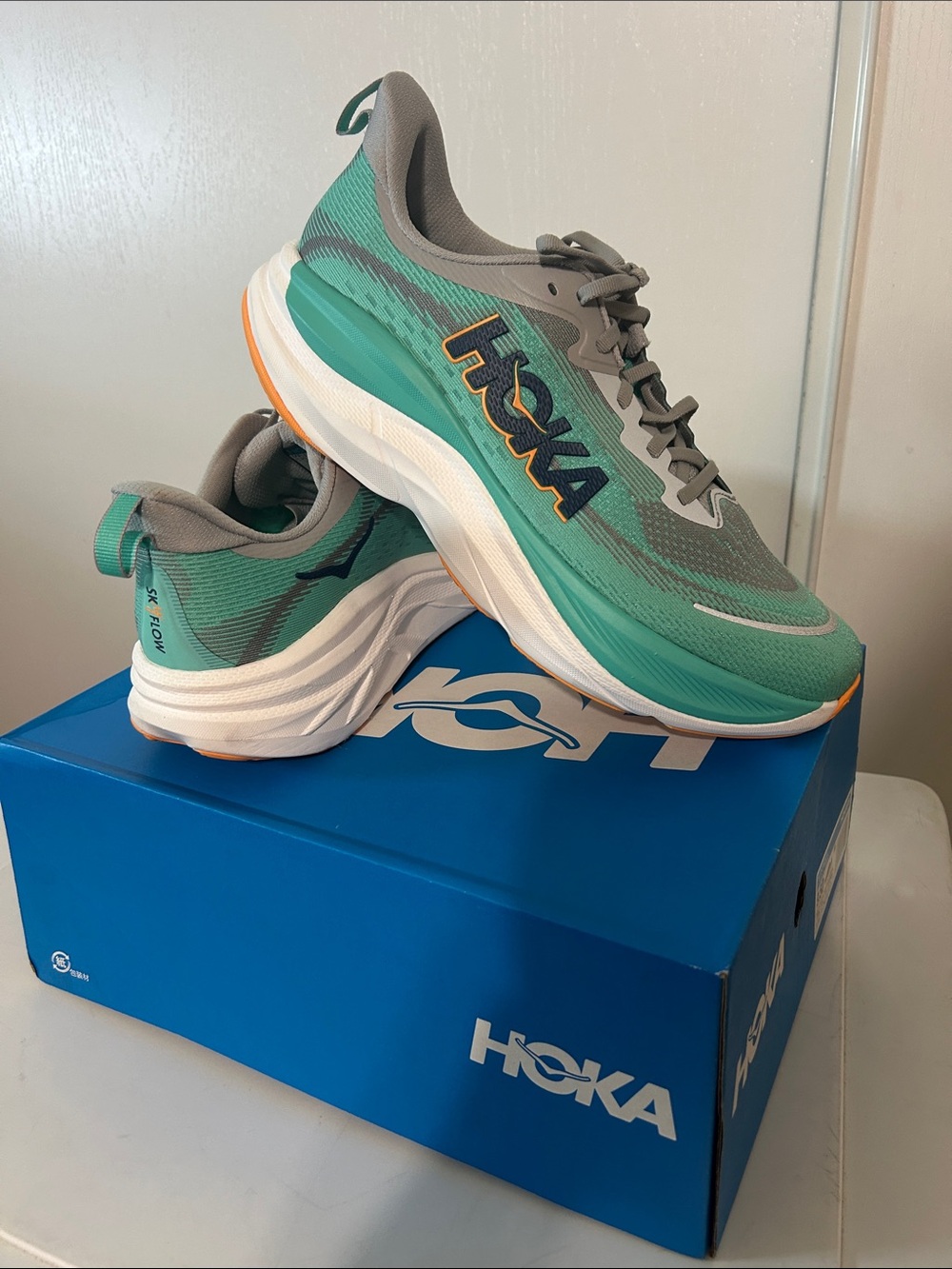 Hoka sky flow Teal and Gray Running Shoes with Orange Accent